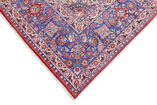 Backside of handmade 1930s Isfahan rug showing knot structure and weave density
