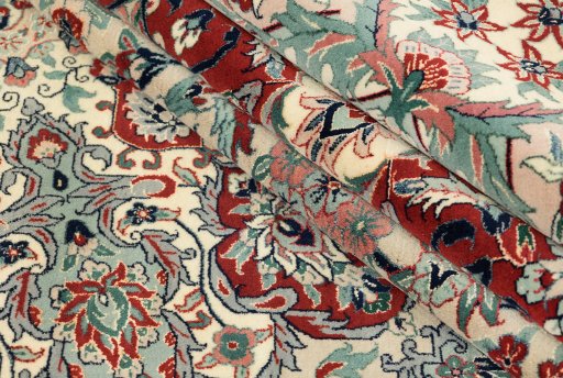 Corner detail of New Isfahan rug showing border pattern and Wool pile