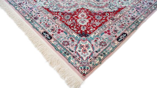 Backside of handmade New Isfahan rug showing knot structure and weave density