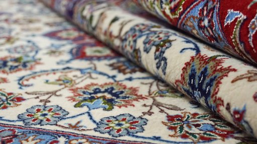 Close-up detail of New Isfahan rug from Iran / Persia showing Wool weave