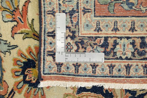 Corner detail of 1920s Isfahan rug showing border pattern and Wool pile