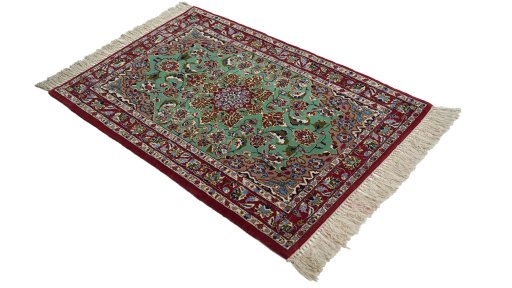 Close-up detail of 1990s Isfahan rug from Iran / Persia showing Wool weave