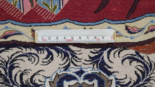 Backside of handmade 1990s Isfahan rug showing knot structure and weave density