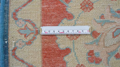 Corner detail of New Isfahan rug showing border pattern and Wool pile