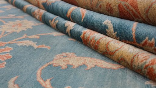Full view of New Isfahan rug from Iran / Persia, 359 × 250 cm in Blue tones