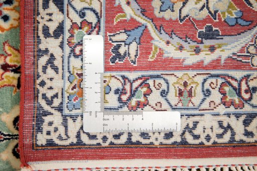 Full view of 1990s Isfahan rug from Iran / Persia, 226 × 146 cm in Green tones