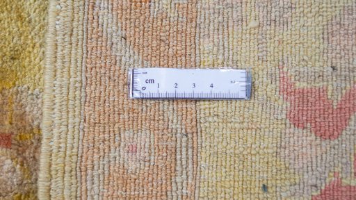 Corner detail of New Isfahan rug showing border pattern and Wool pile