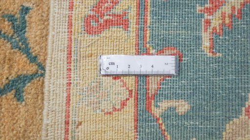 Corner detail of New Isfahan rug showing border pattern and Wool pile