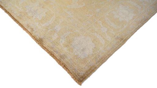 Backside of handmade New Isfahan rug showing knot structure and weave density