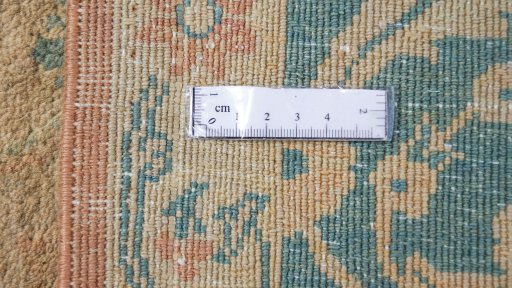 Corner detail of New Isfahan rug showing border pattern and Wool pile