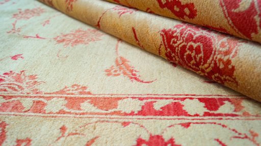Close-up detail of New Isfahan rug from Iran / Persia showing Wool weave