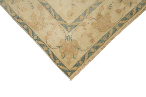 Backside of handmade New Isfahan rug showing knot structure and weave density