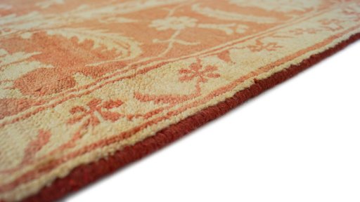 Backside of handmade New Isfahan rug showing knot structure and weave density
