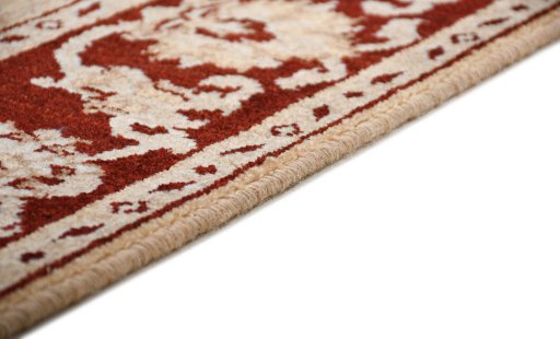 Backside of handmade New Isfahan rug showing knot structure and weave density