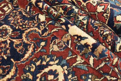 Corner detail of 1920s Isfahan rug showing border pattern and Wool pile