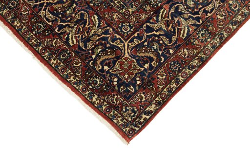 Backside of handmade 1920s Isfahan rug showing knot structure and weave density