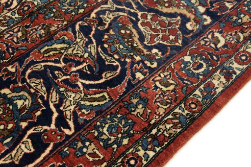Central medallion detail of 1920s Isfahan rug from Iran / Persia