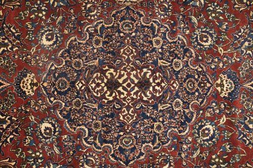 Close-up detail of 1920s Isfahan rug from Iran / Persia showing Wool weave