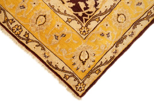 Backside of handmade New Isfahan rug showing knot structure and weave density