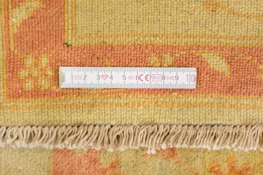 Corner detail of New Isfahan rug showing border pattern and Wool pile
