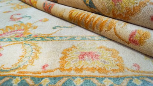 Close-up detail of New Isfahan rug from Iran / Persia showing Wool weave