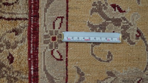 Corner detail of New Isfahan rug showing border pattern and Wool pile
