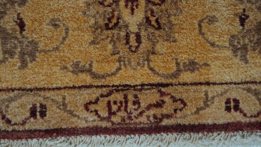 Close-up detail of New Isfahan rug from Iran / Persia showing Wool weave