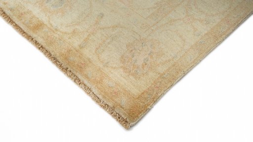 Backside of handmade New Isfahan rug showing knot structure and weave density
