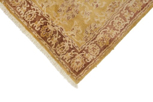 Backside of handmade New Isfahan rug showing knot structure and weave density