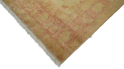 Backside of handmade New Isfahan rug showing knot structure and weave density