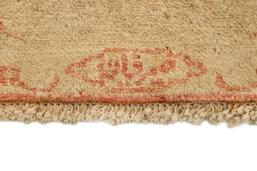 Backside of handmade New Isfahan rug showing knot structure and weave density