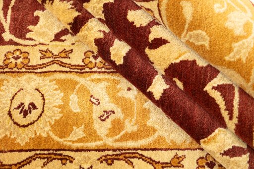 Corner detail of New Isfahan rug showing border pattern and Wool pile
