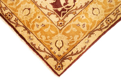 Backside of handmade New Isfahan rug showing knot structure and weave density