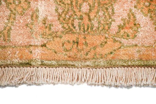 Backside of handmade New Isfahan rug showing knot structure and weave density