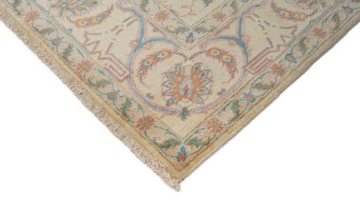 Backside of handmade New Isfahan rug showing knot structure and weave density
