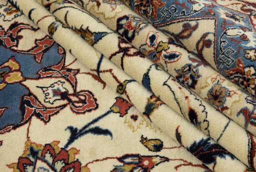 Full view of 1970s Isfahan rug from Iran / Persia, 440 × 320 cm in Cream tones