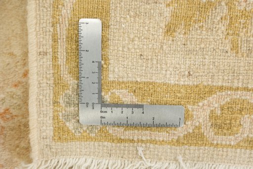 Corner detail of New Isfahan rug showing border pattern and Wool pile