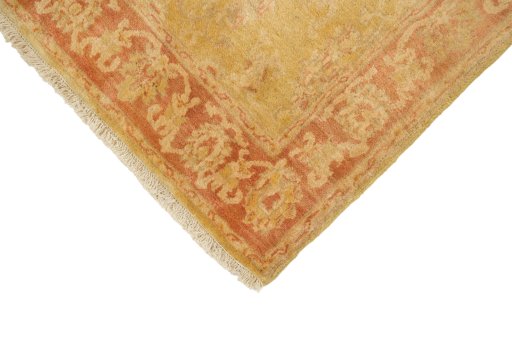 Backside of handmade New Isfahan rug showing knot structure and weave density