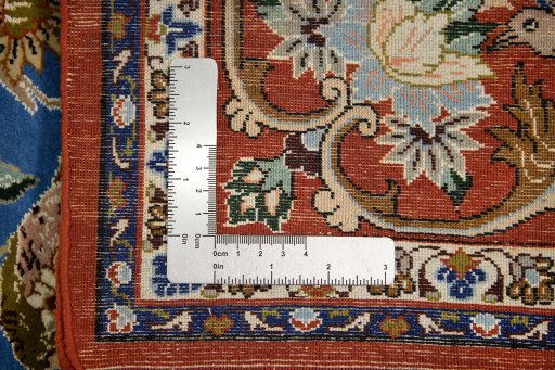 Corner detail of 1990s Isfahan rug showing border pattern and Silk pile