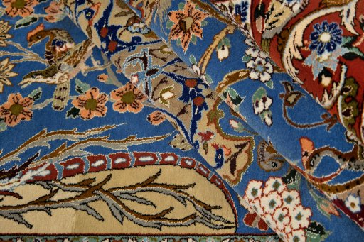 Close-up detail of 1990s Isfahan rug from Iran / Persia showing Silk weave
