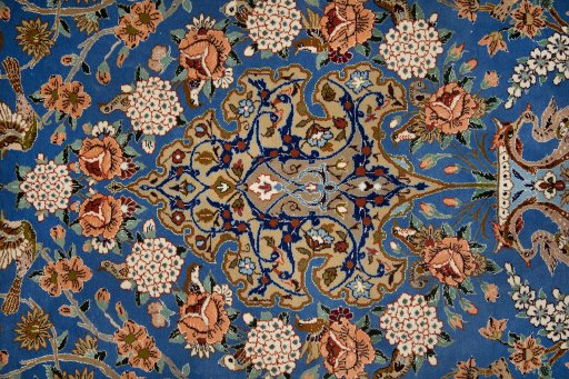 Close-up detail of 1990s Isfahan rug from Iran / Persia showing Silk weave
