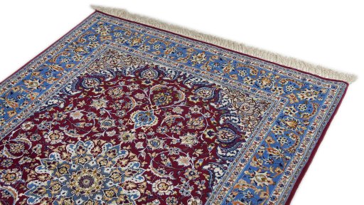 Surface texture of 1990s Isfahan rug with natural Wool and intricate pattern