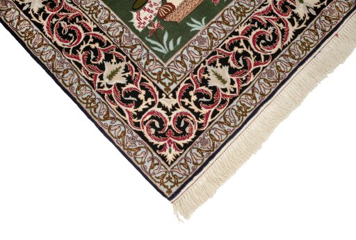 Backside of handmade New Isfahan rug showing knot structure and weave density