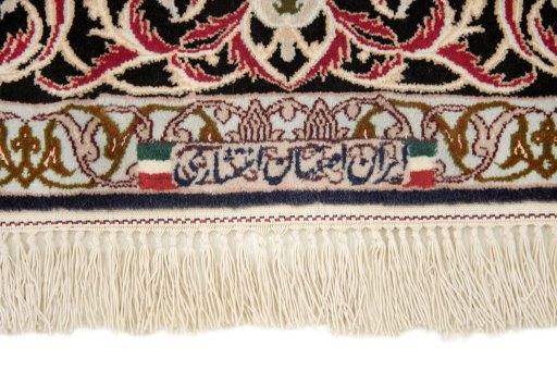 Central medallion detail of New Isfahan rug from Iran / Persia