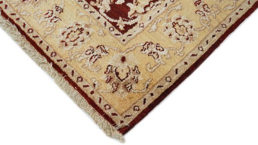 Backside of handmade New Isfahan rug showing knot structure and weave density