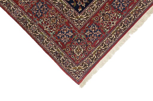 Backside of handmade 1930s Isfahan rug showing knot structure and weave density