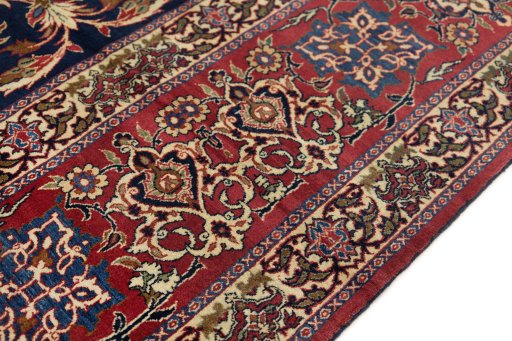 Close-up detail of 1930s Isfahan rug from Iran / Persia showing Wool weave