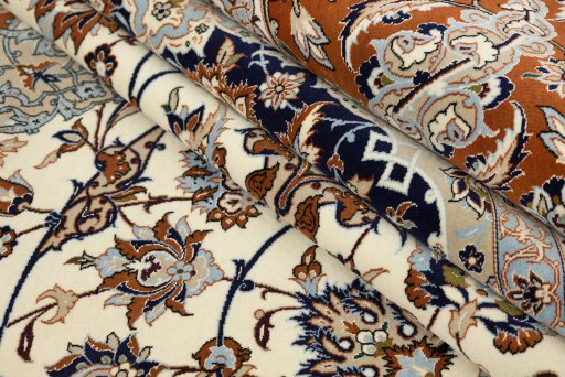 Corner detail of 1980s Isfahan rug showing border pattern and Wool pile