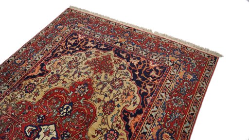 Surface texture of 1920s Isfahan rug with natural Wool and intricate pattern