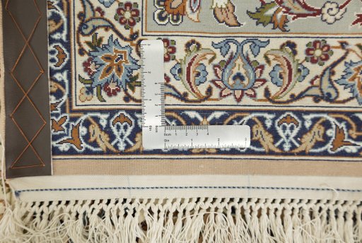 Close-up detail of New Isfahan rug from Iran / Persia showing Wool weave